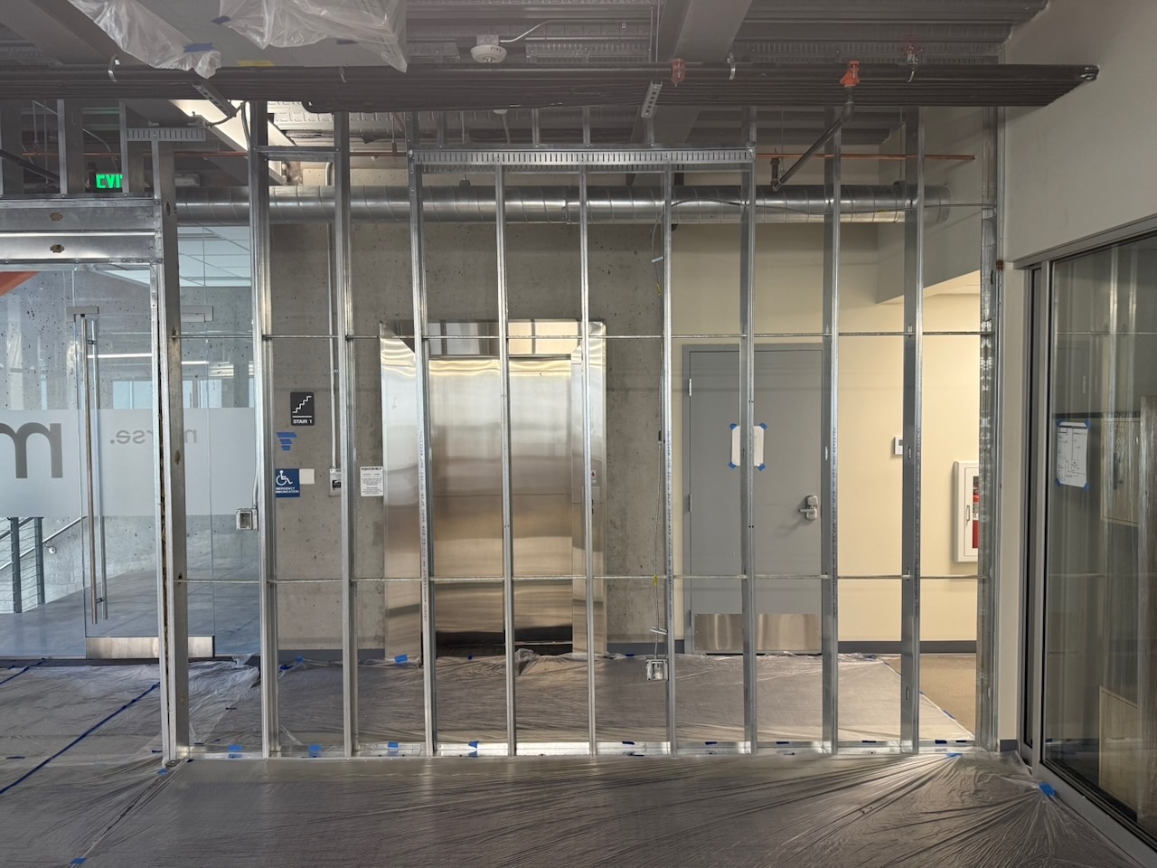 Kaart general contracting team framing a commercial storefront build-out